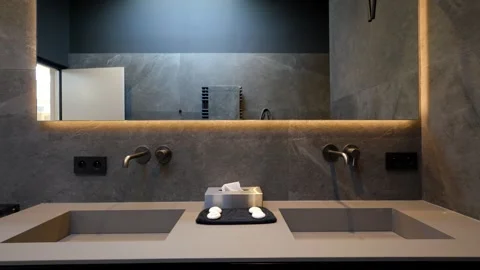 Contemporary Double Sink Bathroom Interior With Stone Countertop in La Rochelle Stock Footage 344443119