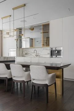 Contemporary kitchen with marble wall panel Stock Photos