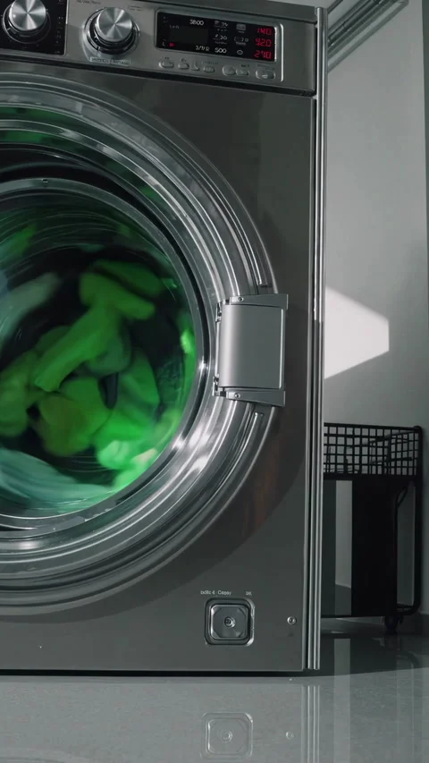 Contemporary Laundry Room Featuring HighEfficiency Washing Machines for Opt.. Stock Footage 300751464