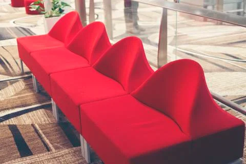 Contemporary lounge zone with cozy sofas locating in business center Stock Photos
