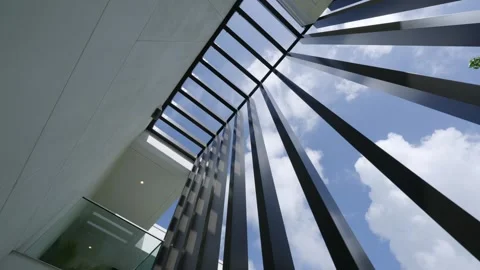 The contemporary modern architectural design features vertical slats and a clear Stock Footage 285795584