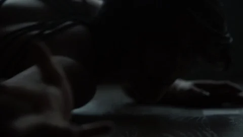 Contemporary modern dancer on floor dancing in dark moody dance studio 스톡 동영상 104269086