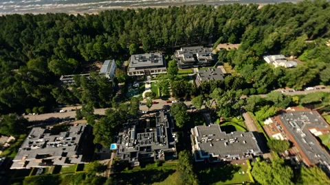 Contemporary residential development surrounded by verdant landscaping Video stock 306387735
