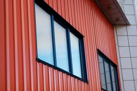 Contemporary urban structure featuring bright reflective windows and clean lines Stock Photos