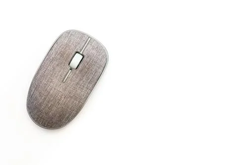 Contemporary used material covered computer mouse in isolation on a white bac Stock Photos