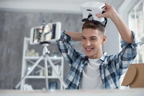 Content blogger talking about 3D model on cam 스톡 사진