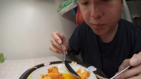 Content creator enjoying meal in detailed close up shot Stock Footage 337209840