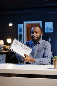 Content creator filming tech tutorial Stock Photos