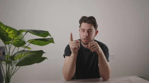 Content Creator Filming Vlog Video on Smartphone in Studio Setting Stock-Footage 345099580