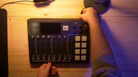 Content Creator is plugin an Recording Device for an Podcast Stock Footage 148721710