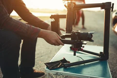 Content creator setting stabilizer gimbal equipment camera for shoot video fo Stock Photos