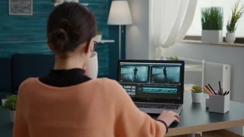 Content creator using video editing software to design montage Stock Footage 171944848