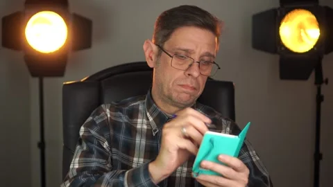 Content creator writing notes in a notebook while planning content ideas. Stock Footage 315571570