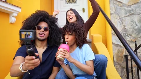 Content creators filming a video blog about refreshing beverages Stock Footage 309200100