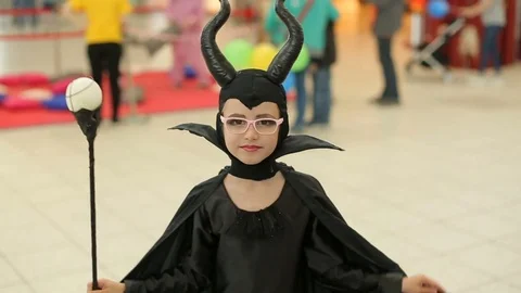 Content girl in costume posing at camera Stock Footage 84581100