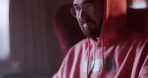 Content guy videogaming in lounge bar Stock Footage 229483849