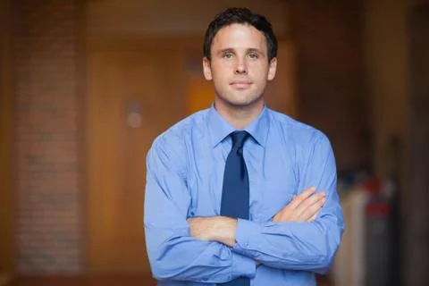 Content handsome lecturer looking at camera Photos