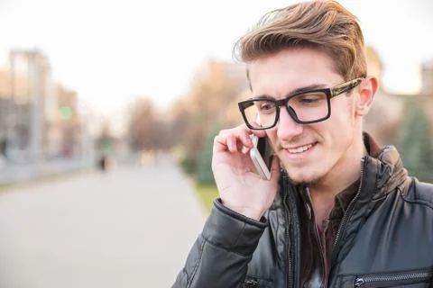 Content man having phone call outside Stock Photos