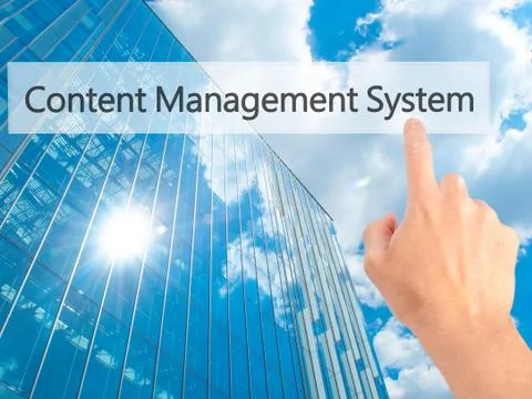 Content Management System - Hand pressing a button on blurred background conc 스톡 사진