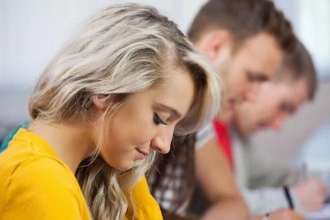 Content students taking notes Stock Photos