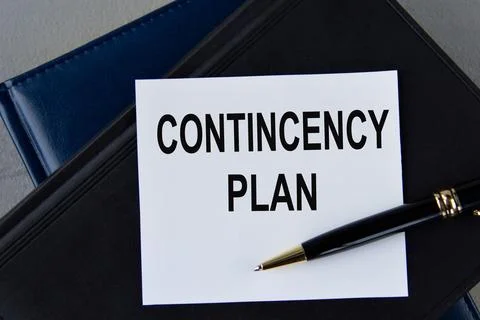 CONTINCENCY PLAN - words on white sheet on a black leather book with pen Stock Photos