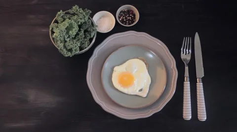 Continental breakfast at home. fried eggs sunny side up in a pan. Vídeos de archivo 68093255