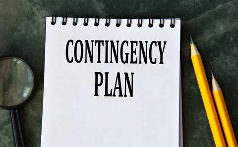 CONTINGENCY PLAN- words in a notebook with pencils and a magnifying glass Stock Photos