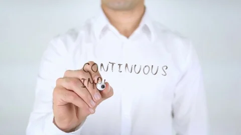 Continous Improvement, Man Writing on Glass Stock Footage