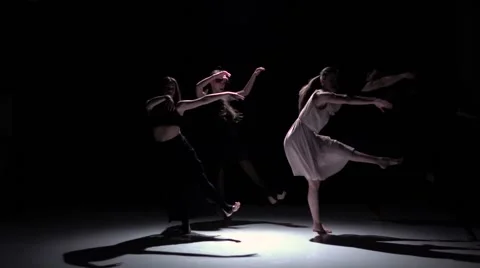 Continue contemporary dance performance of five dancers on black, shadow, slow Video stock 61178912