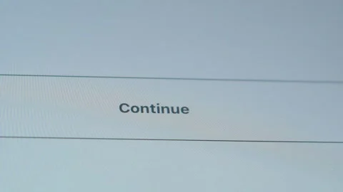 Continue on the device screen when installing the application. Agreement to cont Stock Footage 163040456