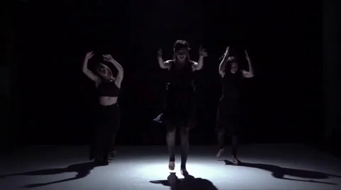 Continue graceful contemporary dance of three dancers in dark on black, shadow Video stock 61179306