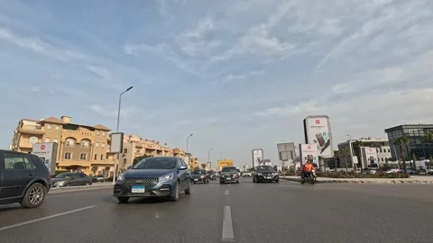 Continuous Car Travel Through New Cairo Streets Showing Buildings Traffic Stock Footage 329764643