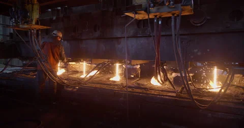 Continuous casting machine at the metallurgical plant - working process. Metal Stock Footage 197030818