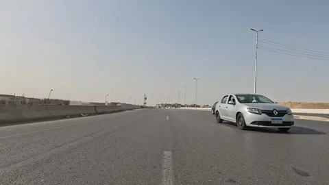 Continuous Drive Along Cairo Ring Road Capturing the Rhythm of Cairo Traffic Stock Footage 329832006