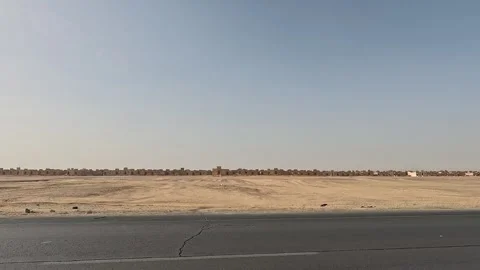 Continuous driving tour along Cairo Fayoum Desert Road through peaceful desert Stock-Footage 329847184