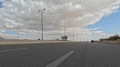 Continuous Highway Traffic Across Desert Route From Cairo Toward Ain Sokhna Stock Footage 330028002