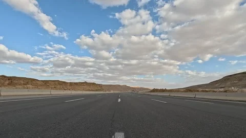 Continuous Highway Traffic Along Eastern Desert Road Between Cairo and Ain Stock Footage 330044037