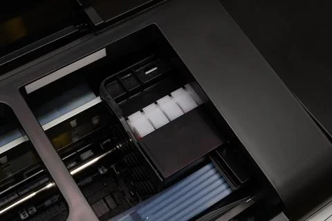 Continuous ink supply system and printer print head.Close-up. Stock Photos