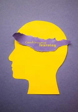 Continuous Learning Mindset Concept with Yellow Human Profile Stock Photos