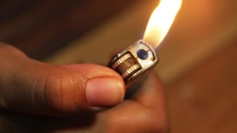 Continuous Lighter Flame Burning Close Up 스톡 동영상 329478338
