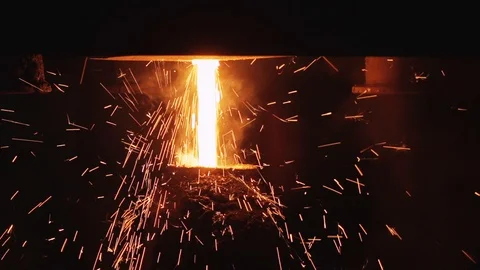 Continuous Molten Metal Stream, With Sparks and Glow, Industrial Foundry  Stock Footage 90489171