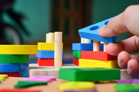 Continuous one line drawing a puzzle pieces put together and some missing. .. Stock Photos