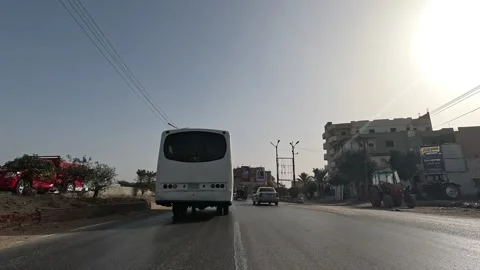 Continuous road journey across Cairo Fayoum Desert Road relaxing desert views Stock Footage 329831136