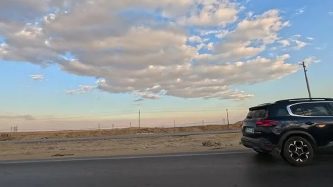 Continuous road journey across Cairo Fayoum Desert Road beautiful desert views Stock Footage 330087233