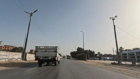 Continuous road journey along Cairo Fayoum Desert Road scenic desert highway Stock-Footage 329831643