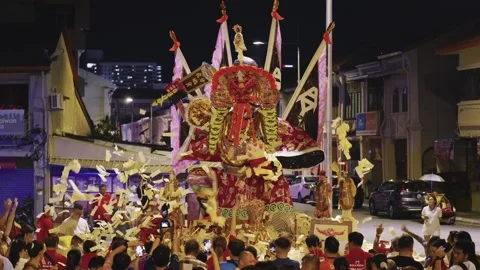Continuous Shower of Flying Joss Paper Over Tai Su Yeh Float during Hungry Stock Footage 346190069