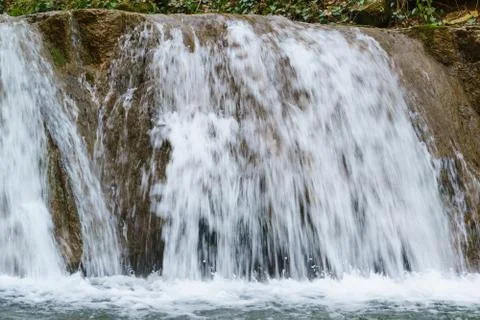 Continuous water flow of the river hidden from the sun the gorge of the Cauca Foto stock