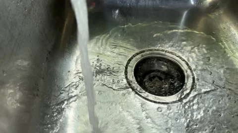 Continuous Water Flow Into Sink Basin Stock Footage 328486802