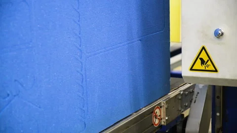Contour cutting of flexible polyurethane foam Stock Footage 278035592
