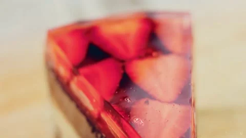 Contour effect of a slice of cake with strawberries and jelly. Macro and slider Stock Footage 231040356